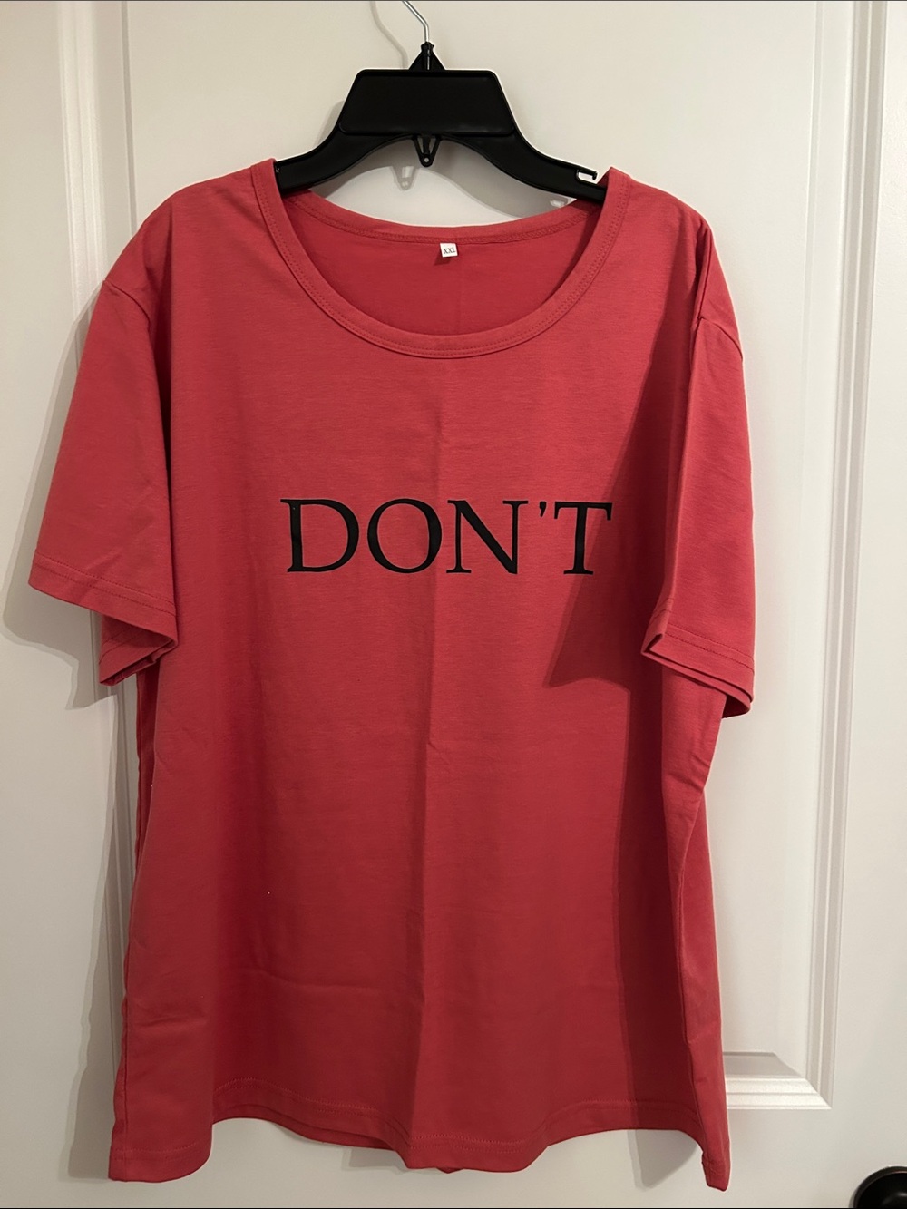 Coral Graphic Tee with "DON'T" Text. NEW!